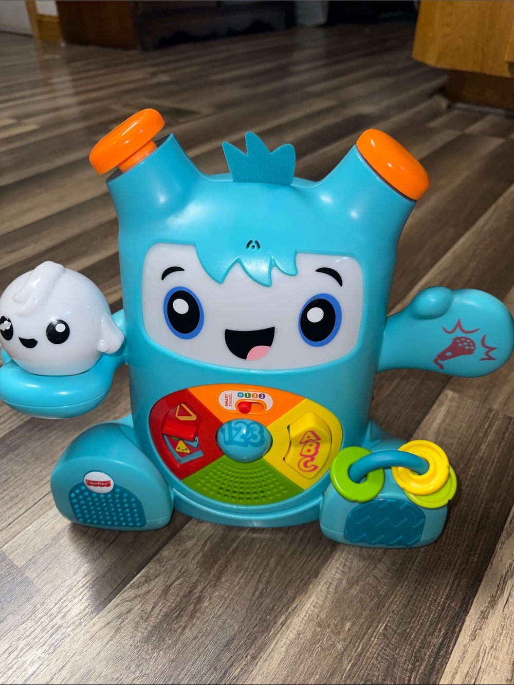 Fisher-Price Teal Interactive Learning Monster with Orange Accents
